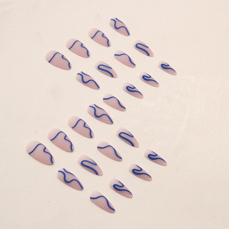 Matte Nude Nails with Blue Wavy Lines
