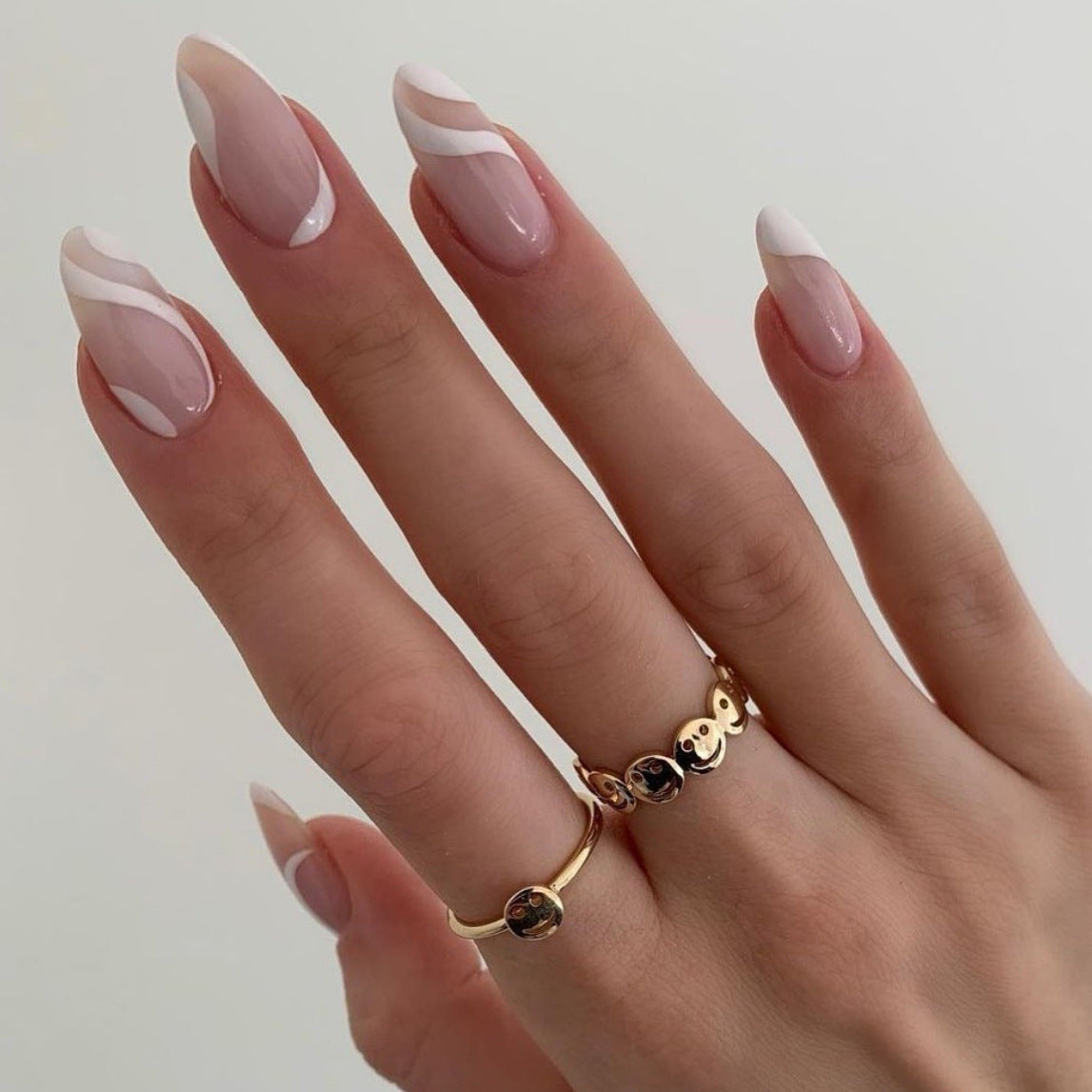 Nude Nails with White Swirls