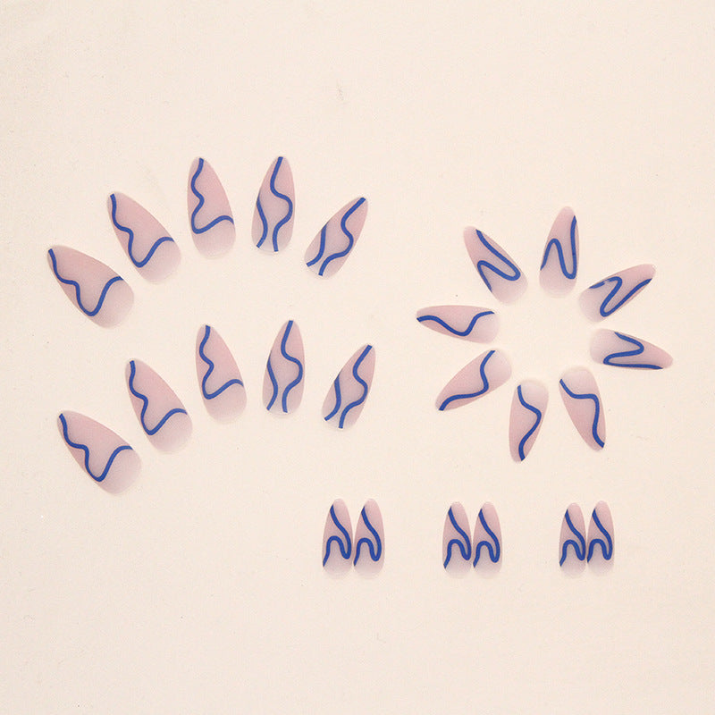 Matte Nude Nails with Blue Wavy Lines