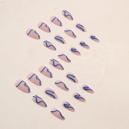 Matte Nude Nails with Blue Wavy Lines
