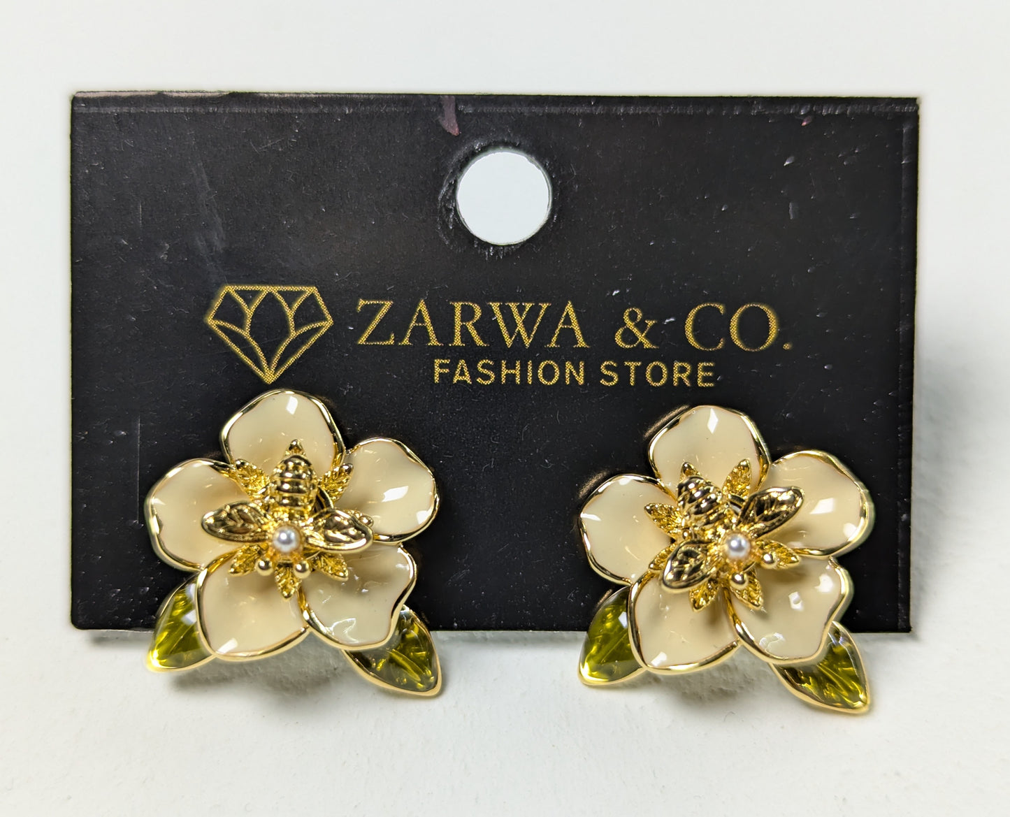 Elegant Enamel Flower Earrings with Rotating Bee Embellishment